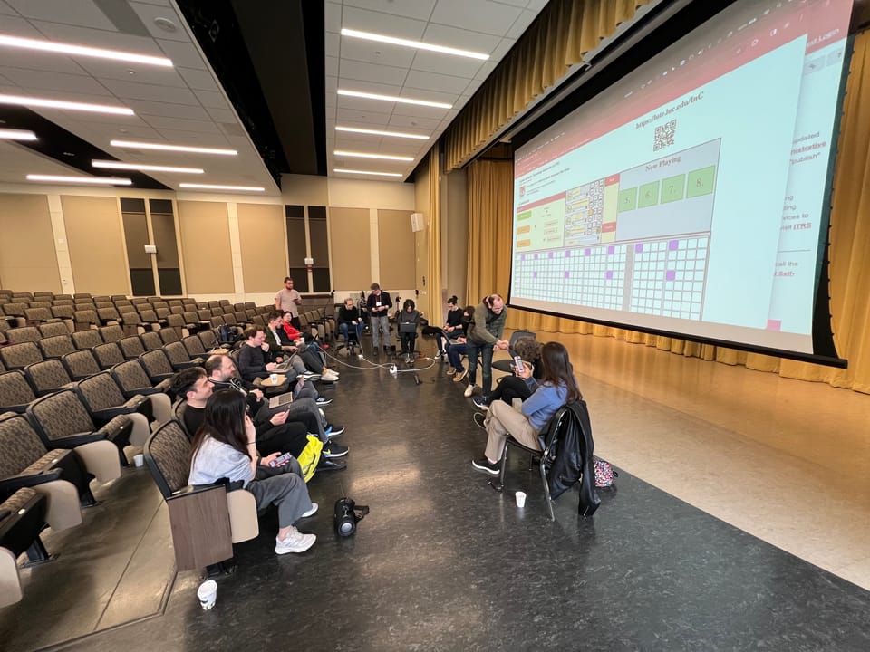 David B. Wetzel and George K. Thiruvathukal lead mobile/wireless performance of Terry Riley's "In C" for Mobile Ensemble at the Web Audio Confernce (WAC) 2024